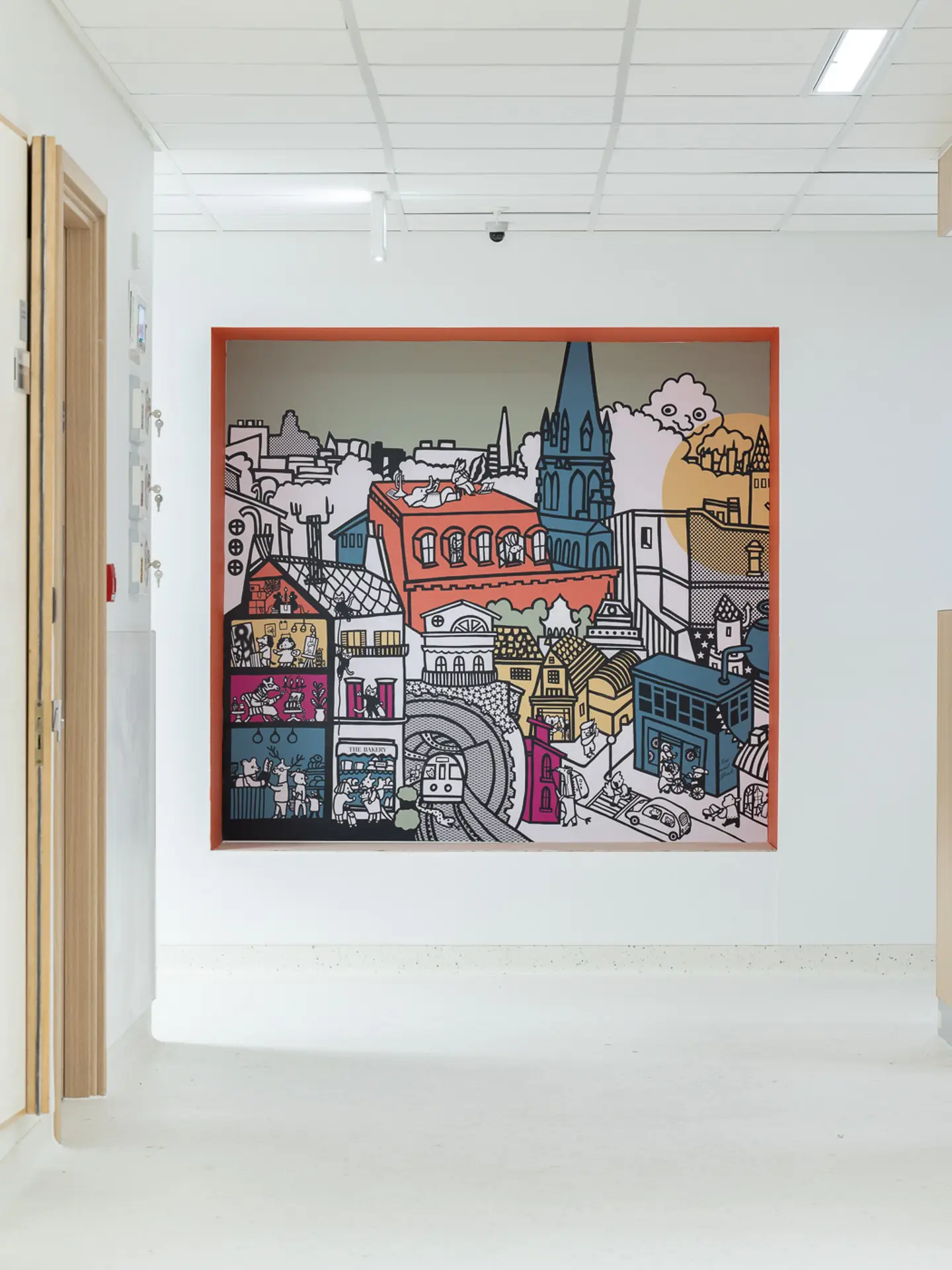 Vibrant painted cityscape in blues, yellows and oranges