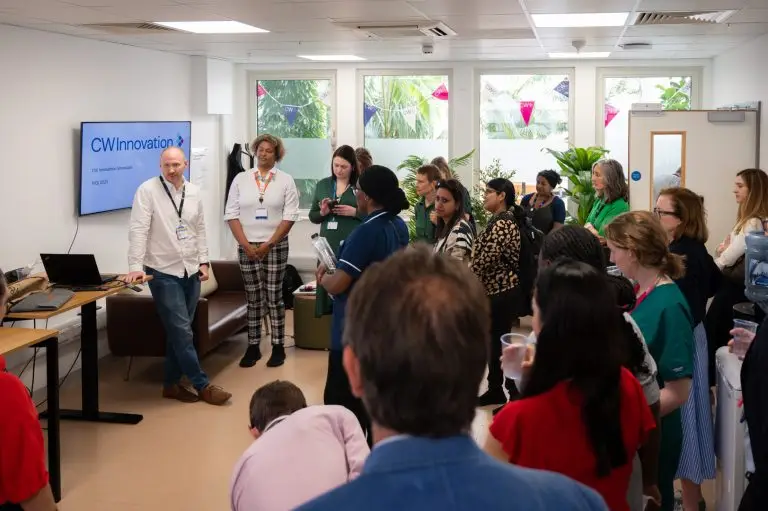 CW Innovation showcase event - group gathering for presentations in CW Innovation Hub.